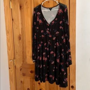 Black dress with red floral design